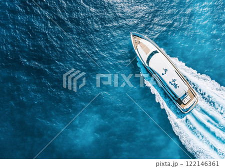 Luxury private yacht boat cruising on blue ocean waters on sunny summer day.Top View.AI Generative. 122146361