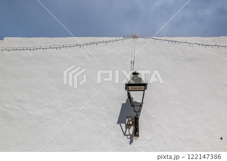 White wall with a lantern, Teguise, Lanzarote, Spain 122147386