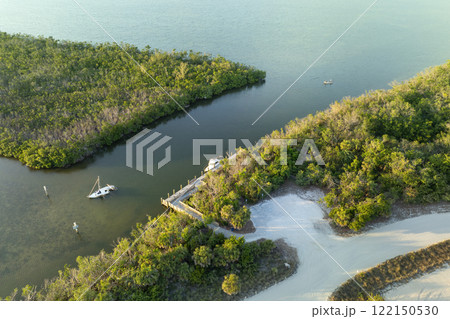 Capsized sunken sailing boat left forsaken on shallow bay waters after hurricane Ian in Manasota, Florida Capsized sunken sailing boat left forsaken on shallow bay waters after hurricane Ian in Manasota, Florida 122150530