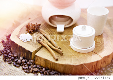 Still life with tea, cinnamon and cloves 122151425