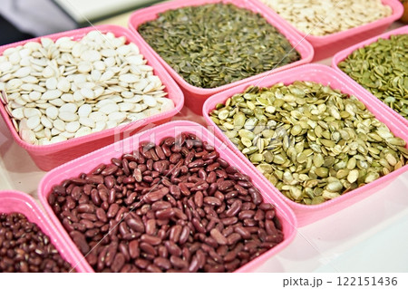 Pumpkin seeds and beans in store 122151436