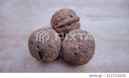 Three Desi Walnuts Isolated, Closeup, Neutral Background 122151626