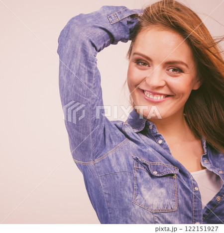 Joyful fashionable woman in denim shirt 122151927