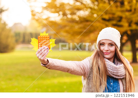Woman with vitamins for autumn. 122151946