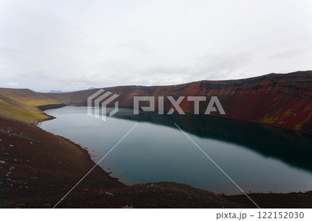 Volcanic crater with water near Landmannalaugar area, Iceland 122152030