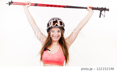 Fit girl with ski poles. 122152146