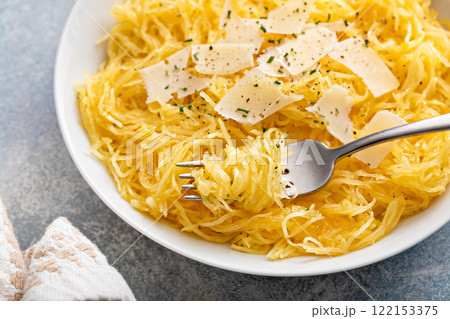 Spaghetti squash roasted and pulled apart served with olive oil and parmesan 122153375