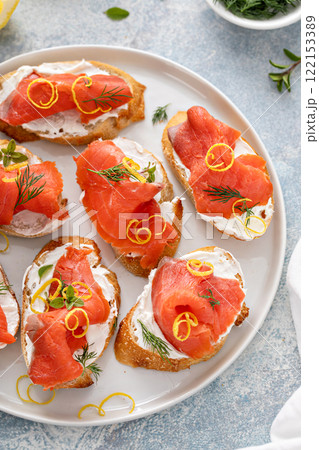 Smoked salmon crostini or bruschetta with cream cheese and lox 122153389