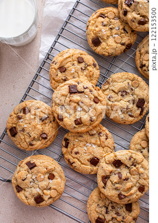 Fresh baked chocolate chip cookies on cooling rack Fresh baked chocolate chip cookies on cooling rack 122153500