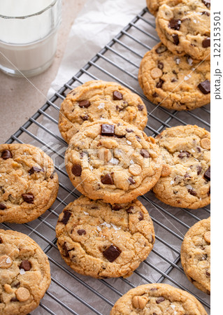 Fresh baked chocolate chip cookies on cooling rack 122153501