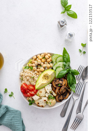 Healthy quinoa buddha bowl with grilled chicken 122153517