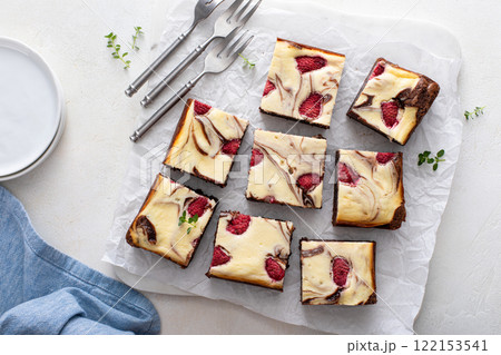 Cheesecake brownies with raspberry and cream cheese swirl Cheesecake brownies with raspberry and cream cheese swirl 122153541