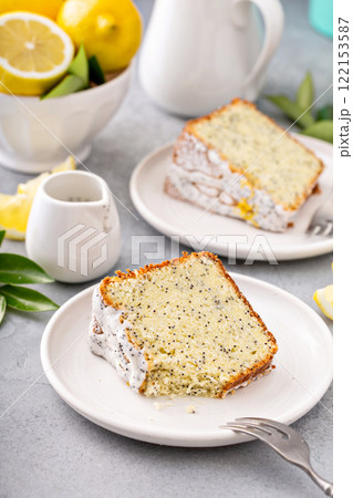 Lemon poppy seed cake on white plate 122153587