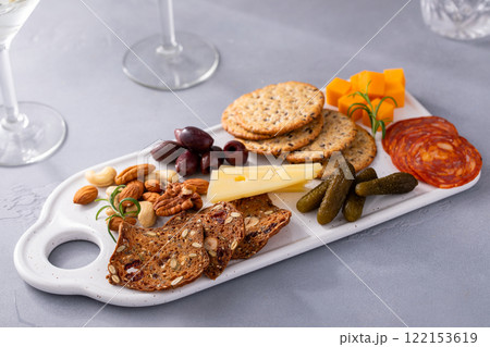 Small charcuterie board for two served with martinis 122153619