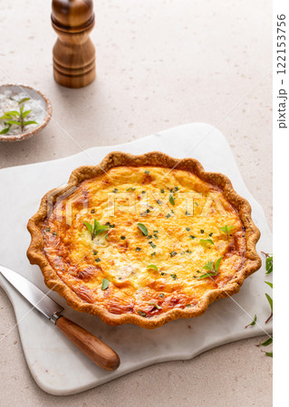 Salmon and cheese quiche freshly baked for breakfast Salmon and cheese quiche freshly baked for breakfast 122153756