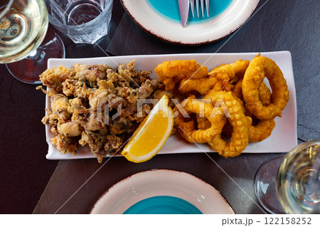 Popular spanish appetizer is squid a la romana and baby andalusian squids 122158252