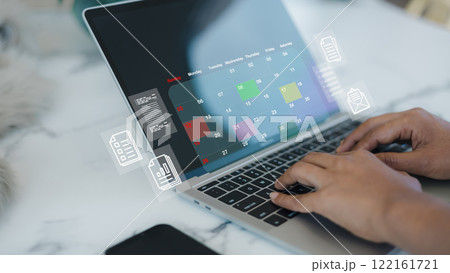 Calendar of monthly appointments and time planning, Hand marking dates on virtual calendar, Managing his business schedule, Setting reminders for important appointments, Agenda plan and schedule event Calendar of monthly appointments and time planning, Hand marking dates on virtual calendar, Managing his business schedule, Setting reminders for important appointments, Agenda plan and schedule event 122161721