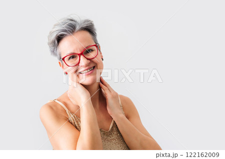 Closeup portrait of gorgeous happy middle aged mature woman, senior older 50 year lady 122162009