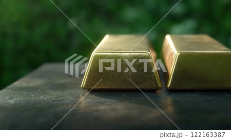 Captivating Close up of Gleaming Gold Bars on a Dark Natural Background Captivating Close up of Gleaming Gold Bars on a Dark Natural Background 122163387