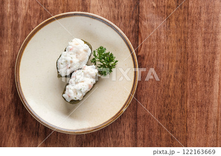 Ground Fish Gunkan Sushi Served on a Plate Ground Fish Gunkan Sushi Served on a Plate 122163669