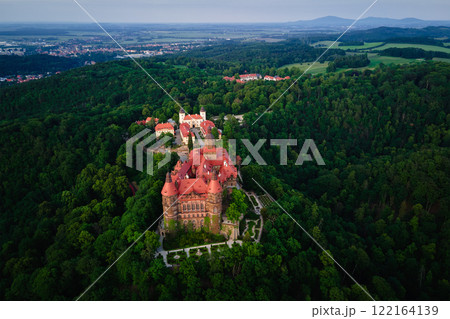 Aerial view of historic medieval castle surrounded by forest. Ksiaz castle in Walbrzych, Poland 122164139