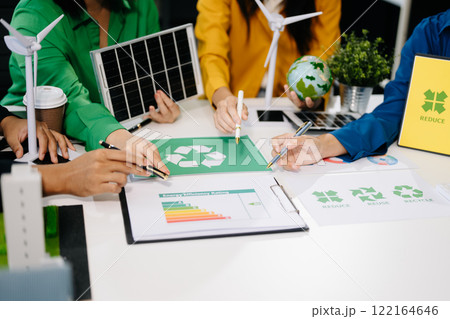 Business team people planning hand using laptop for working technology and business Net zero and carbon neutral concept. 122164646