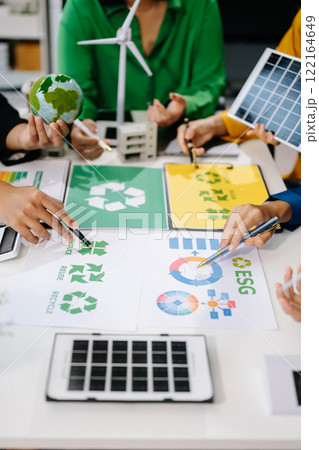 Business team people planning hand using laptop for working technology and business Net zero and carbon neutral concept. Business team people planning hand using laptop for working technology and business Net zero and carbon neutral concept. 122164649