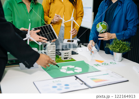 Business team people planning hand using laptop for working technology and business Net zero and carbon neutral concept. Business team people planning hand using laptop for working technology and business Net zero and carbon neutral concept. 122164913