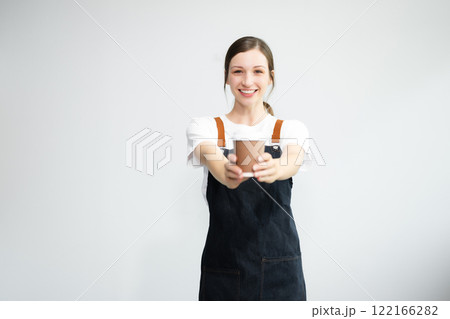 Woman entrepreneur or shop owner. Isolated small business owner or barista with apron on white background. Woman entrepreneur or shop owner. Isolated small business owner or barista with apron on white background. 122166282