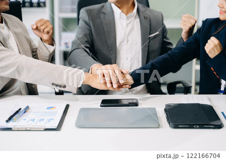 Business partnership handshake concept.Photo two coworkers handshaking process Business partnership handshake concept.Photo two coworkers handshaking process 122166704