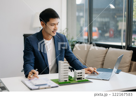 Considering buying a home, investing in real estate. Broker signs a sales agreement. agent, lease agreement, successful deal 122167583