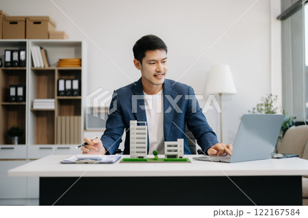 Considering buying a home, investing in real estate. Broker signs a sales agreement. agent, lease agreement, successful deal Considering buying a home, investing in real estate. Broker signs a sales agreement. agent, lease agreement, successful deal 122167584