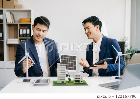 business team people planning and discussing on recycle reduce reuse policy symbol in office meeting room. Green business company and Solar Energy Environment city Concept. business team people planning and discussing on recycle reduce reuse policy symbol in office meeting room. Green business company and Solar Energy Environment city Concept. 122167790