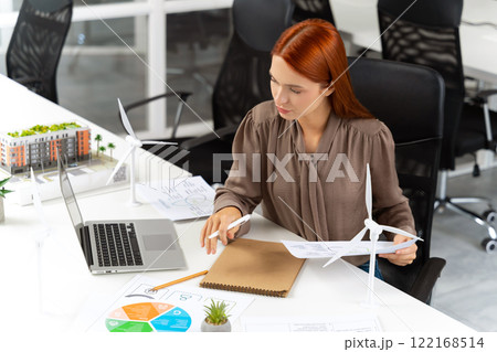 Top view of a ginger woman working in the office Top view of a ginger woman working in the office 122168514