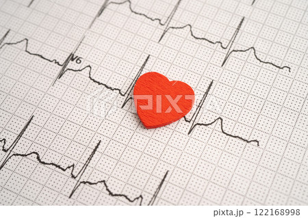Red heart on electrocardiogram ECG with red heart, heart wave, heart attack, cardiogram report. 122168998