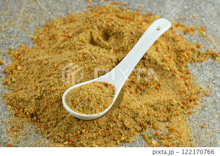Natural seasoning with flavor enhancer, dried vegetables and salt 122170766