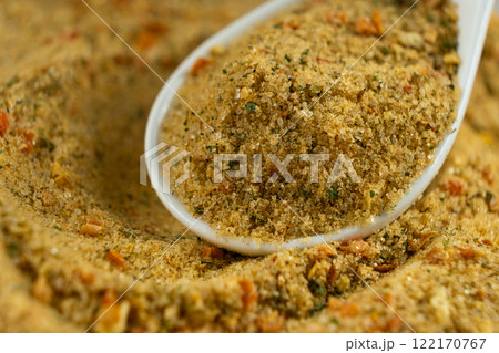 Natural seasoning with flavor enhancer, dried vegetables and salt Natural seasoning with flavor enhancer, dried vegetables and salt 122170767