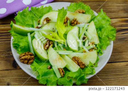 Waldorf salad on a wooden table. Top view 122171243