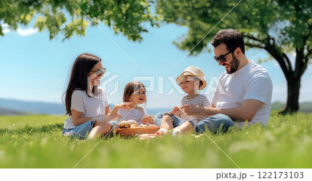 A joyful family enjoying a picnic together in nature on a sunny day. Generated image 122173103