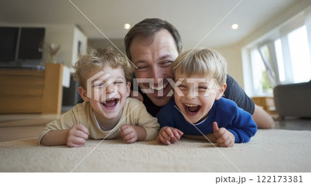 Father joyfully embracing his sons at home, lying on the floor and sharing laughter. Generated image Father joyfully embracing his sons at home, lying on the floor and sharing laughter. Generated image 122173381