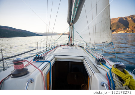 Yacht sailing in Adriatic sea. Close-up view of the deck, mast and sails. Yachting concept 122178272
