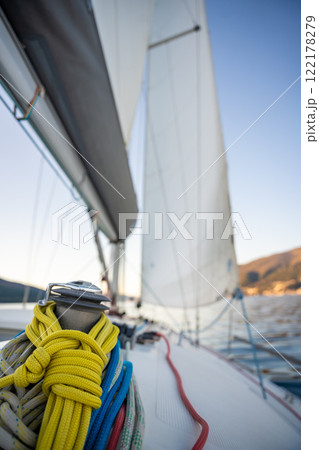 Yacht sailing in Adriatic sea. Close-up view of the deck, mast and sails. Yachting concept 122178279