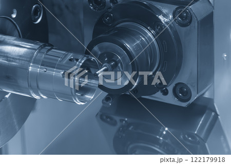 The CNC lathe machine milling the metal tube parts by milling spindle. 122179918