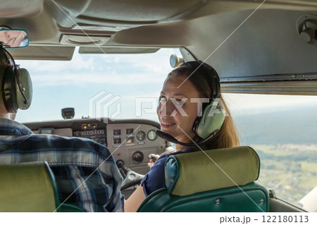 Pilot preparing for flight while enjoying the aviation experience 122180113