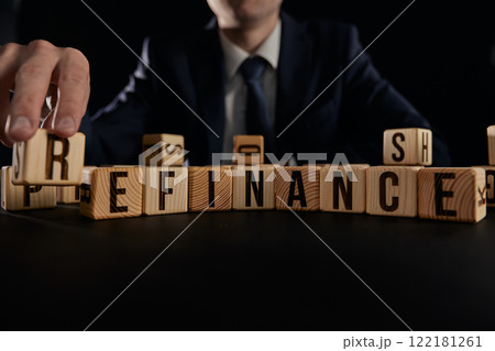 Refinance. Cubes form the word Refinance. Business concept of the word Refinance 122181261