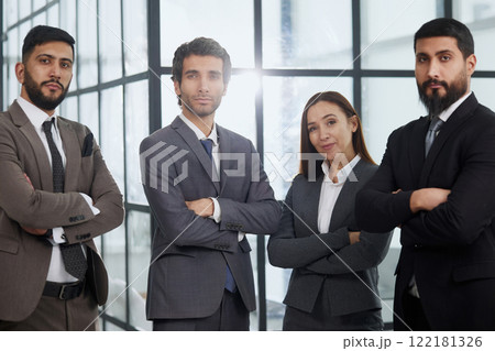 Portrait, collaboration and diversity with a business team standing arms crossed together in their office. 122181326