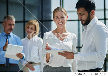 Business group working together on new project Business group working together on new project 122181554