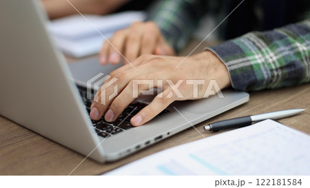 close up business male use laptop computer in office close up business male use laptop computer in office 122181584