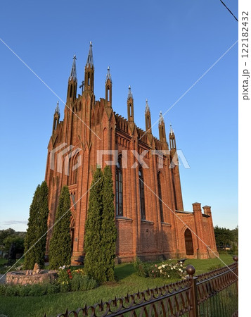 Historic Red Brick Neo-Gothic Church in Evening Light 122182432