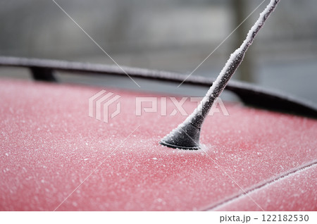 Frozen roof with antenna on car. Concept for winter time and transportation. 122182530